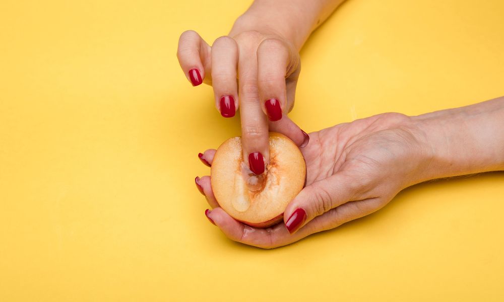 Woman holding peach