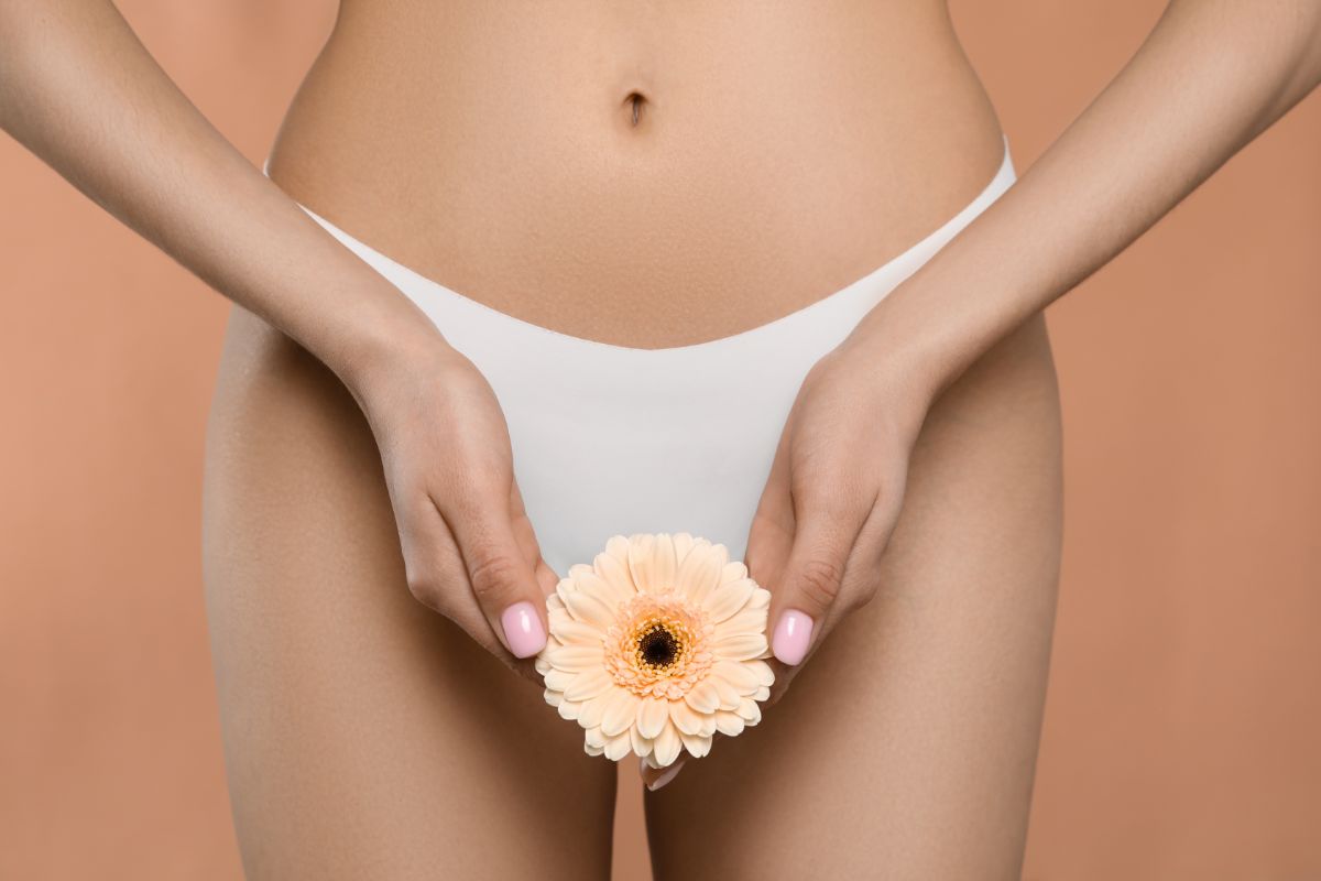 Woman in the undrepants with flower